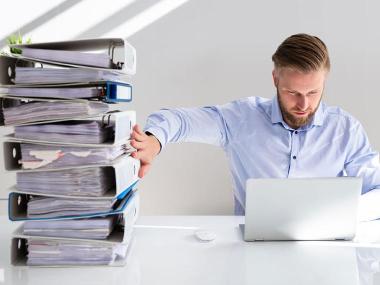 man with laptop on the table