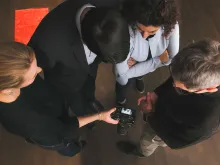 Persone con fotocamera